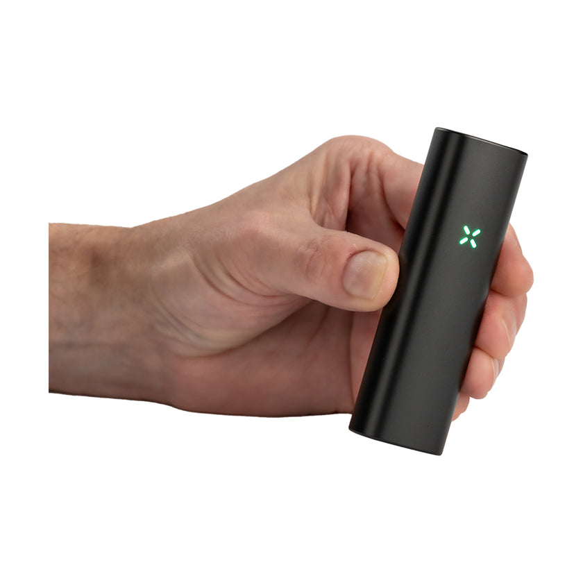 PAX Mini Onyx Vaporizer in hand view Lightly used