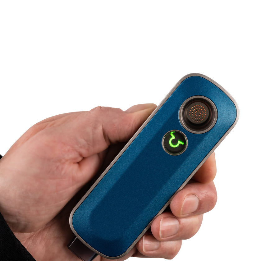 Lightly Used Firefly 2 Vaporizer in hand View specs